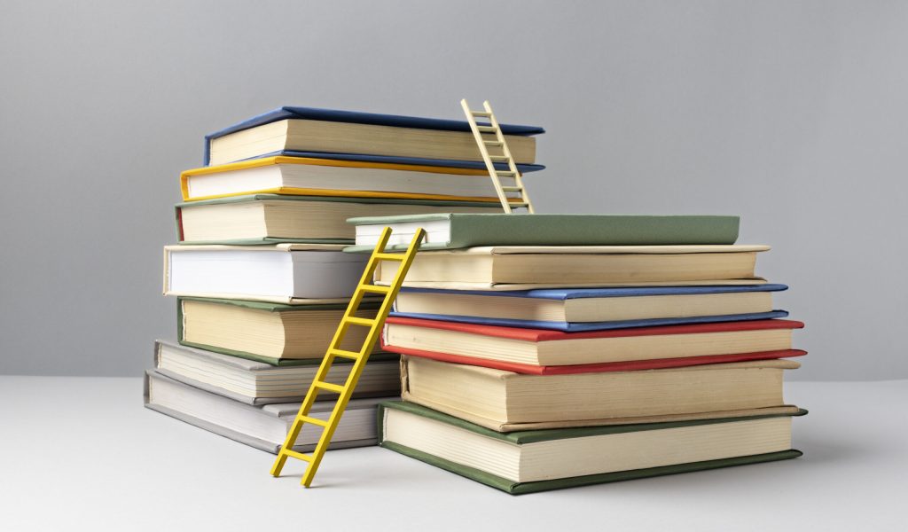 front-view-stacked-books-ladders-education-day